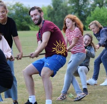 UK Summer Camps campers doing the tug of war