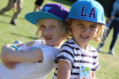 youngest campers wearing snapbacks smiling at uk sleepaway camps in england