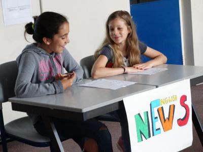 teenage girls in fun interactive english lesson at uk summer school near london