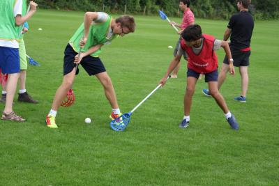 XUK Excel Summer camp children playing lacrosse