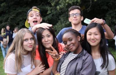 summer camp friends enjoying activities in uk learning english