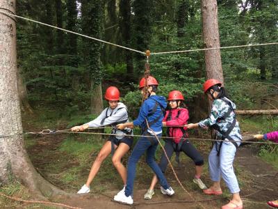 campers at water and forest adventure activities residential summer camp england