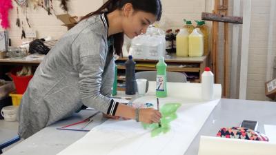 teenage girl painting at best summer camp in the uk