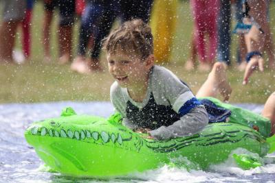 boy slip n slide summer camp uk london kids