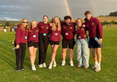 group of XUK staff members doing their Summer Camp Job