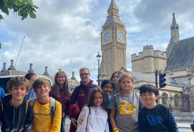 group of children and staff members in London attending an English language summer school
