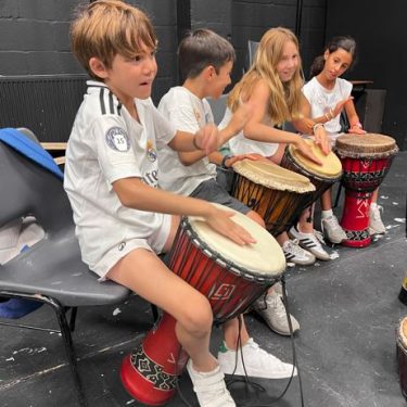 Group drumming workshops helping kids overcome homesickness
