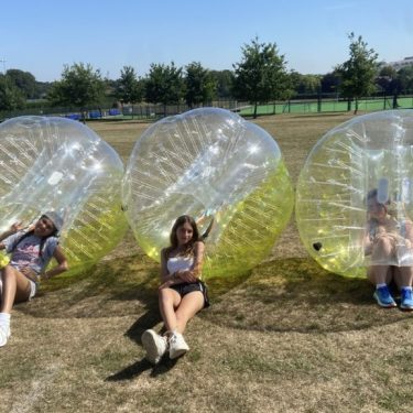 Health at Summer camps by relaxing and playing bubble football