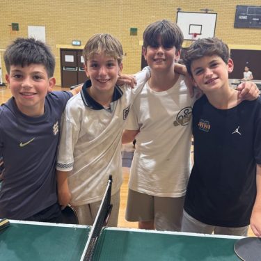 Boys playing table tennis at a UK summer language courses
