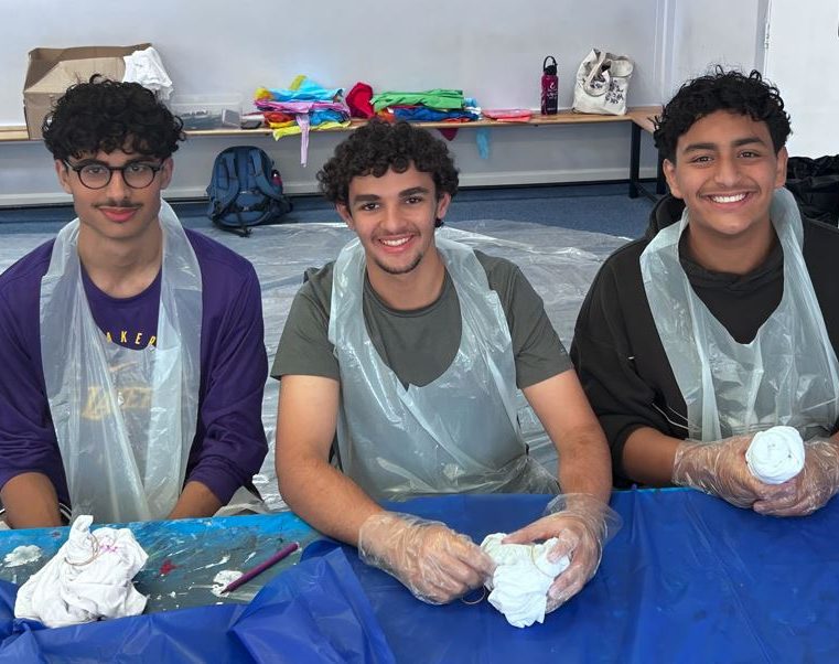 Teens boys enjoying art and craft at Holiday summer camps