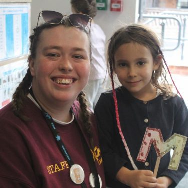 Nurse summer job at XUK Camps providing first aid and care to children during summer camp UK